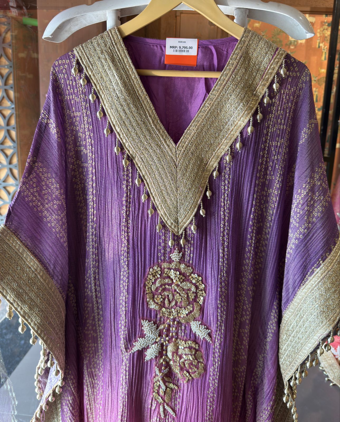 Kaftan dress featuring a vibrant ombré color